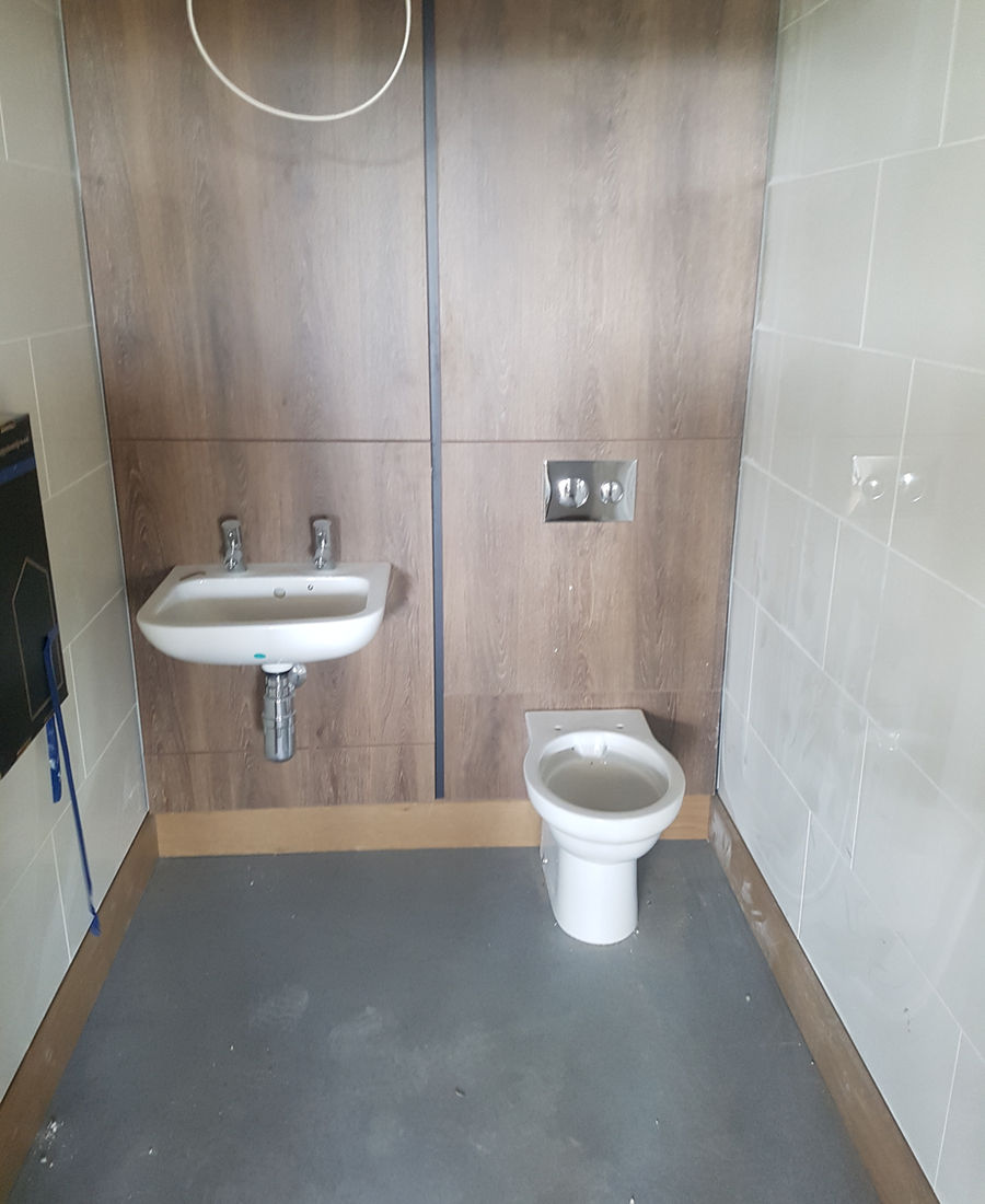 Completed washroom with concealed plumbing services